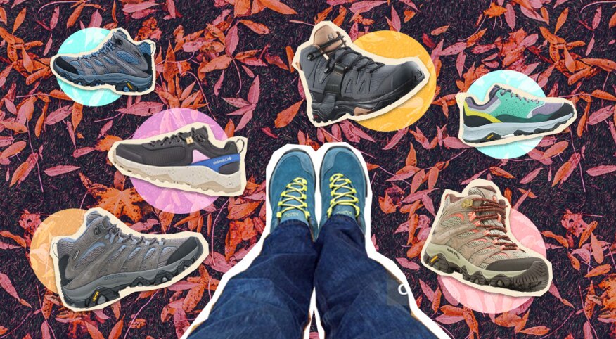 Legs with sneakers on grass, surrounded by 6 pairs of other types of boots/walking shoes