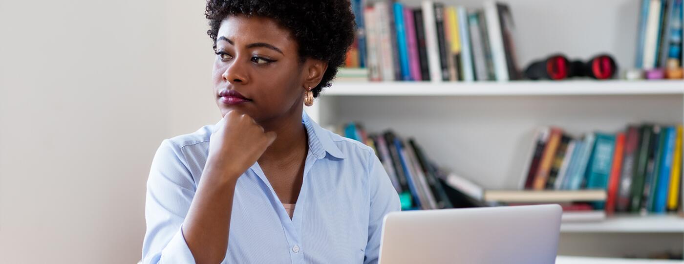 African american businesswoman with depression at work