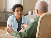 Granddad giving grandson financial advice