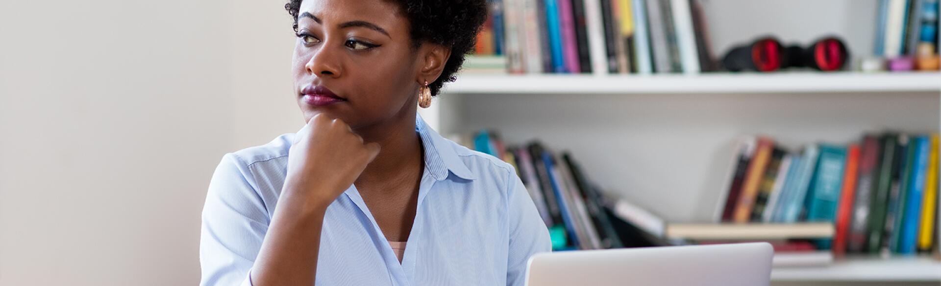 African american businesswoman with depression at work