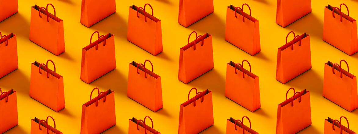Pattern of red-orange shopping bag on a yellow background