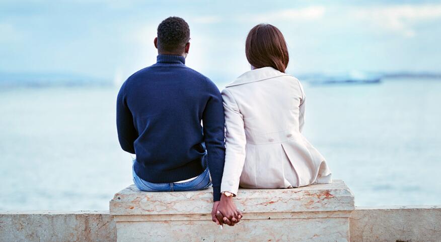 image_of_couple_from_behind_holding_hands_GettyImages-947725718_extension_1540.jpg