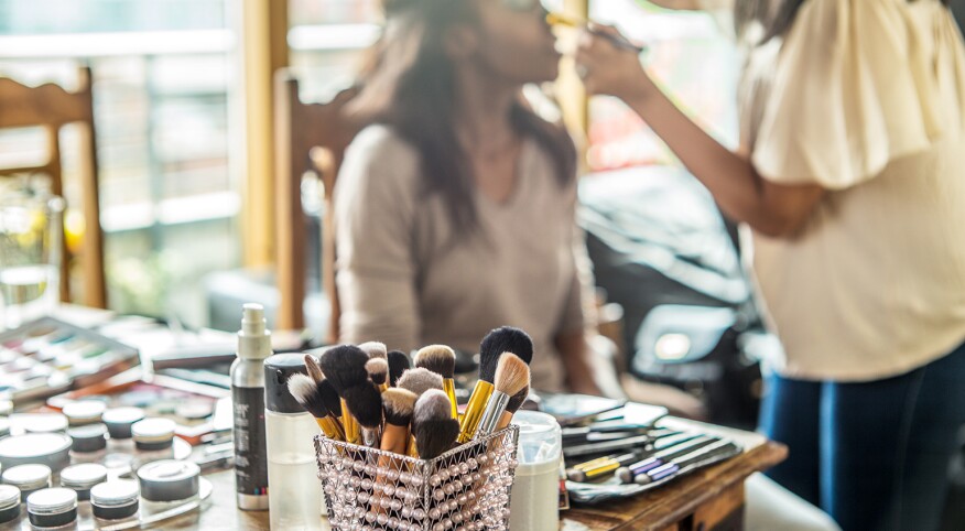 woman getting her makeup professionally done