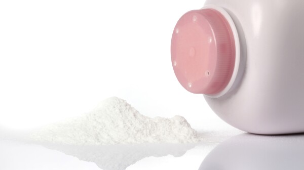 Baby talcum powder container on white background