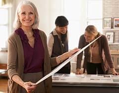 240-woman-grey-hair-office-co-workers
