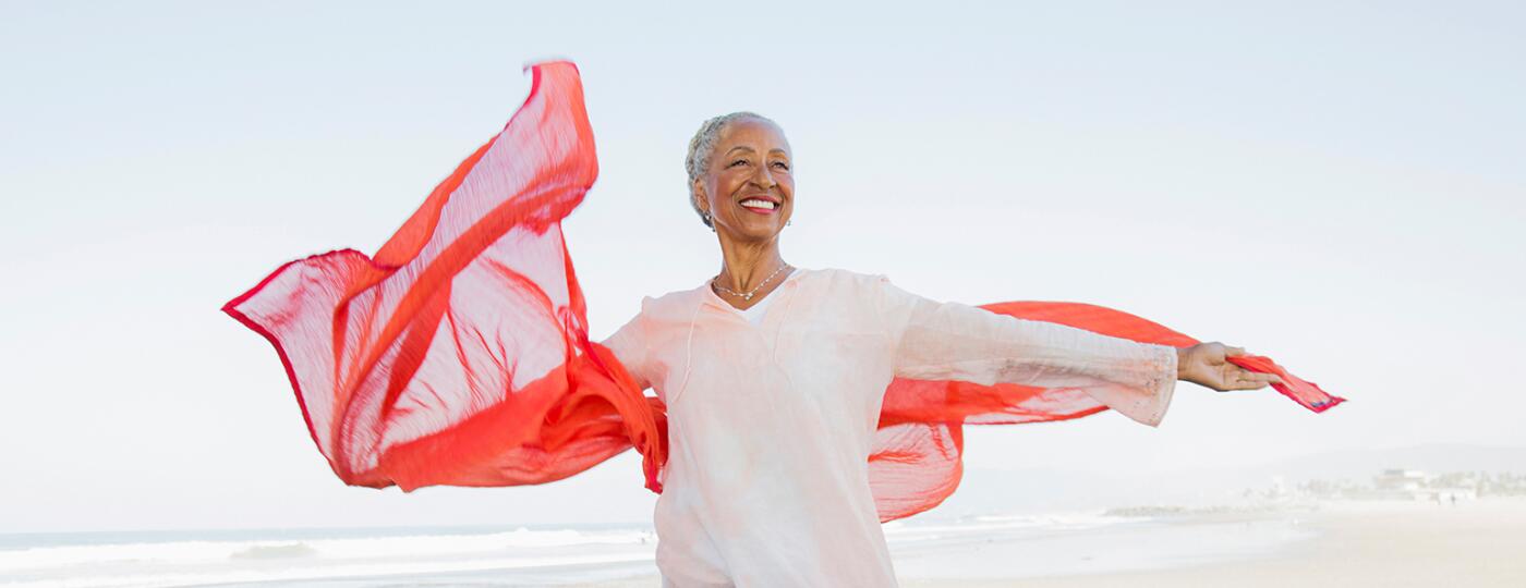 image_of_mature_black_woman_on_beach_GettyImages-905548586_1540.jpg