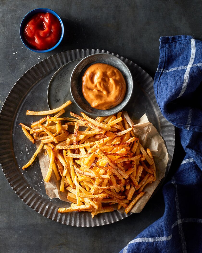 Root vegetable recipe styled on autumnal rustic background