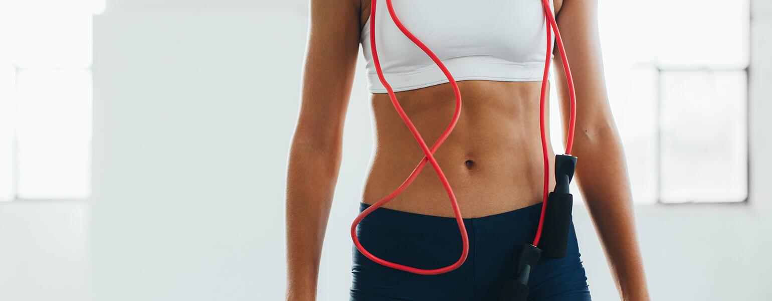 image_of_womans_flat_stomach_with_jumprope_hanging_from_neck_Stocksy_txpa33217d90LZ200_OriginalDelivery_1183186_1540.jpg
