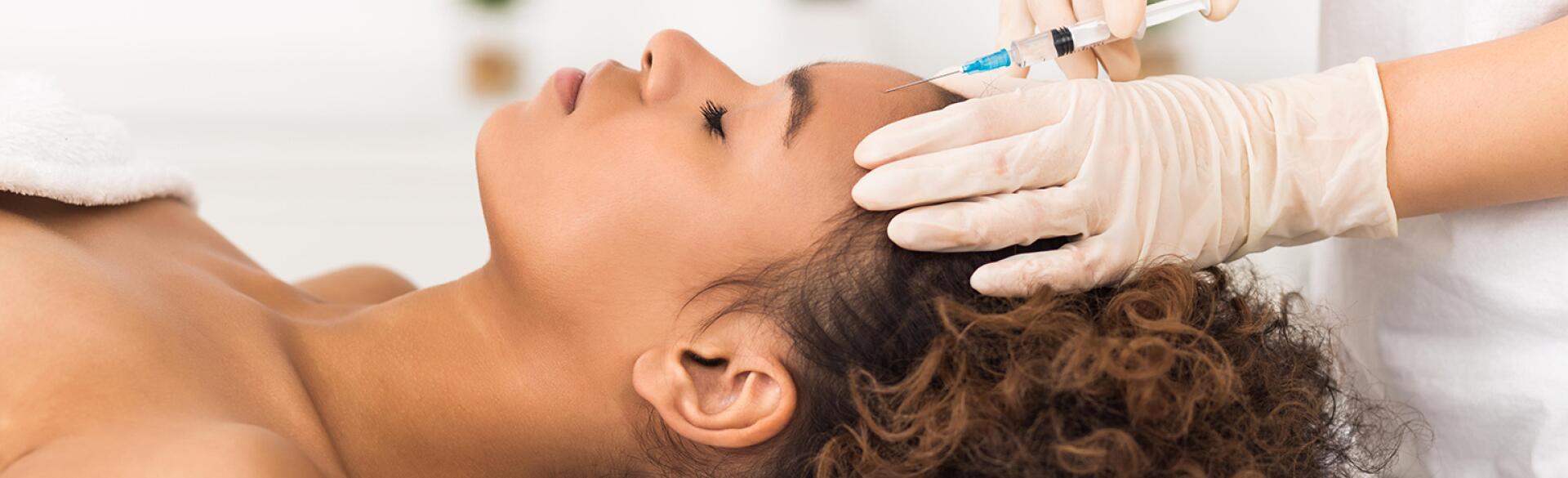 image_of_black_woman_getting_medi_spa_treatment_RRXEAW_1540.jpg
