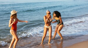 women on a girls trip on the beach