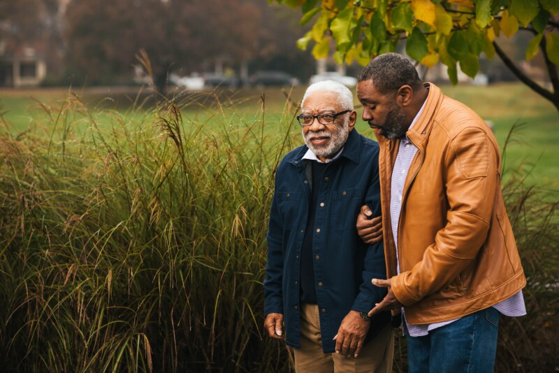 A son helps his father in Frederick, Maryland.