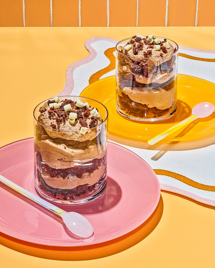 Overhead photo of frozen trifle on bright orange background