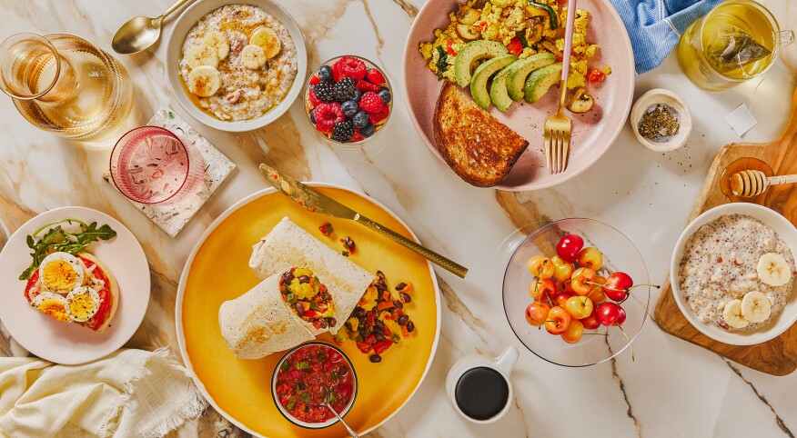 Breakfast meal styled on colorful surface