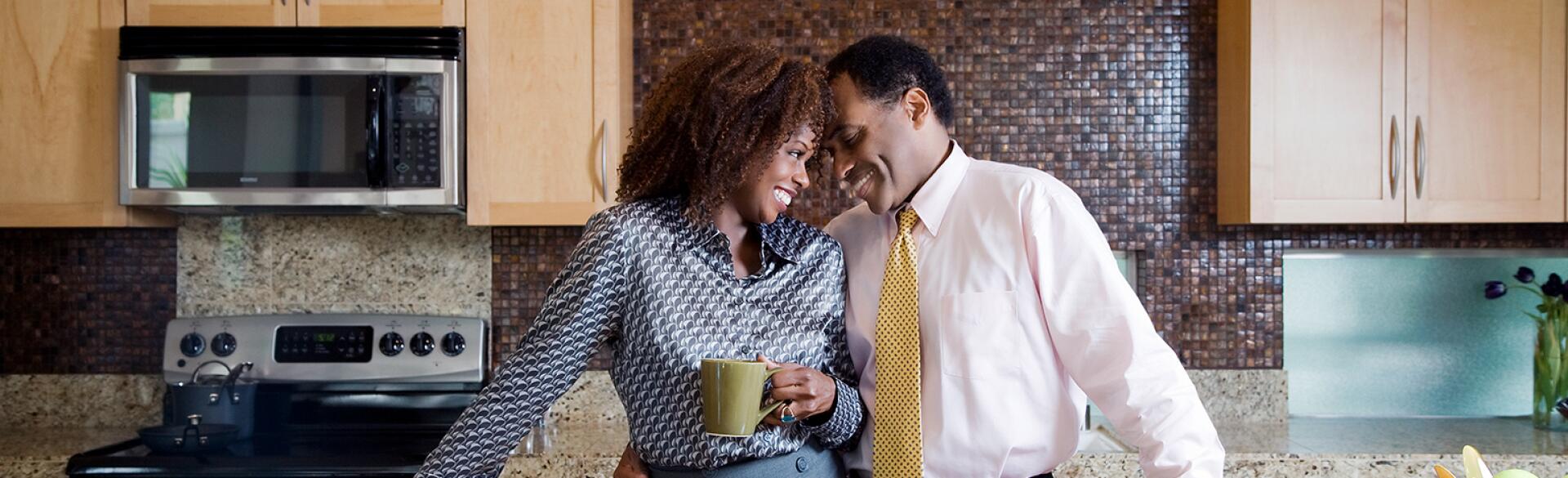 image_of_black_couple_touching_foreheads_in_kitchen_GettyImages-91497683_1540.jpg