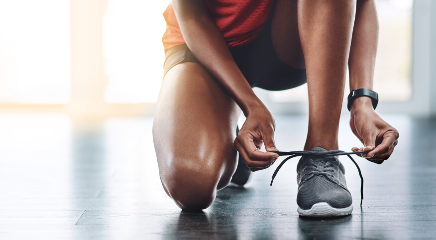 image_of_woman_tieing_shoes_GettyImages-1132747451_1800