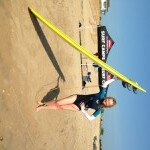 Barbara Hannah Grufferman, posing with surfboard