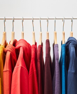 image_of_color_cordinated_clothes_on_rack_Stocksy_txp38011005upS300_Large_2413123_1800.jpg