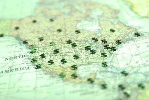 North American map with dollar signs