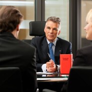 Financial adviser with clients