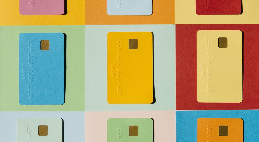 Colorful Credit Cards On Colorful Checked Background
