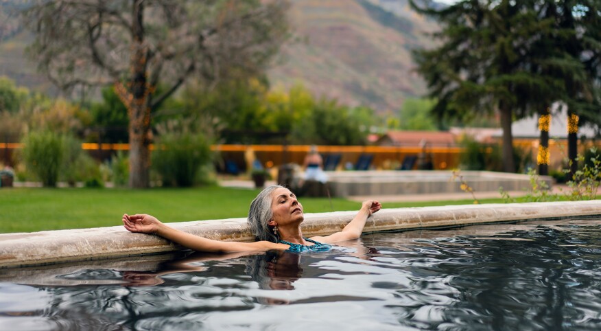 Woman in hot spring at Durango Hot Springs Resort and Spa in Colorado