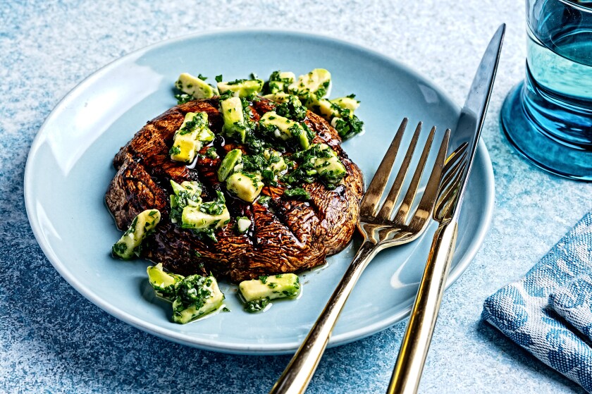 Portobello mushroom recipe on a blue background for a healthy New Year