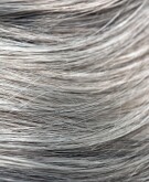 Close-up of gray strands of hair