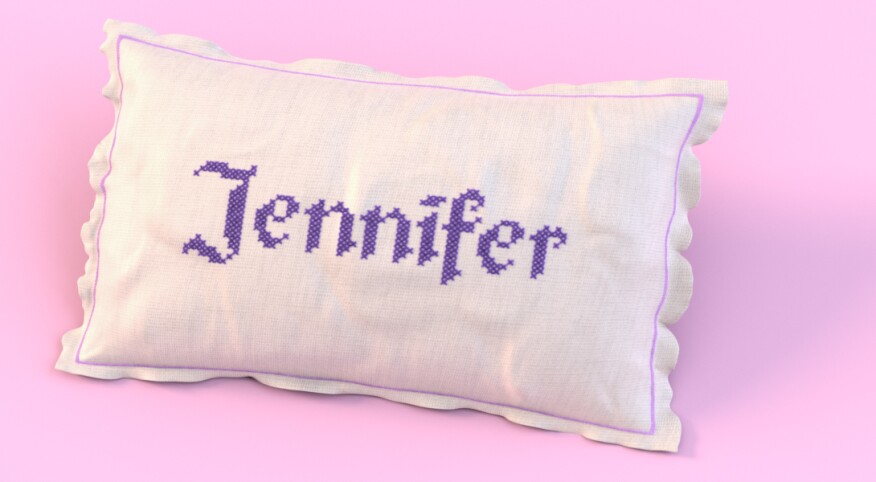 Pillow with the common name jennifer stitched on