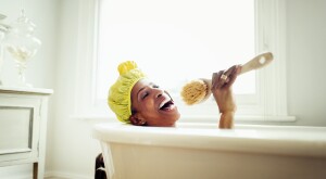 image_of_black_woman_in_bathub_with_shower_cap_GettyImages-639546321_1540.jpg