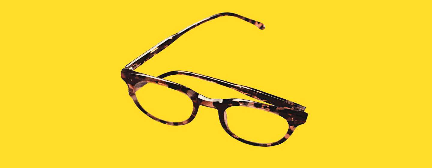 gif_of_reading_glasses_disappearing_on_yellow_background_1440x560.gif