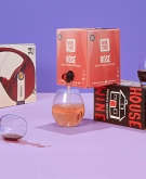 group of boxed wines on a purple background