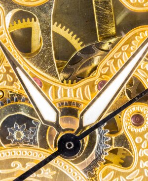 Macro photography of the mechanism of a clock inside
