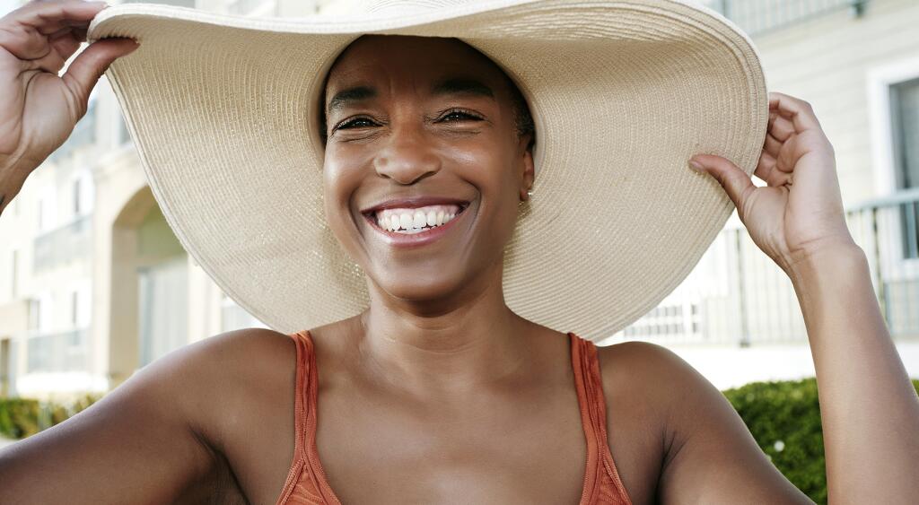 image_of_smiling_woman_in_hat_GettyImages-514408411_1800