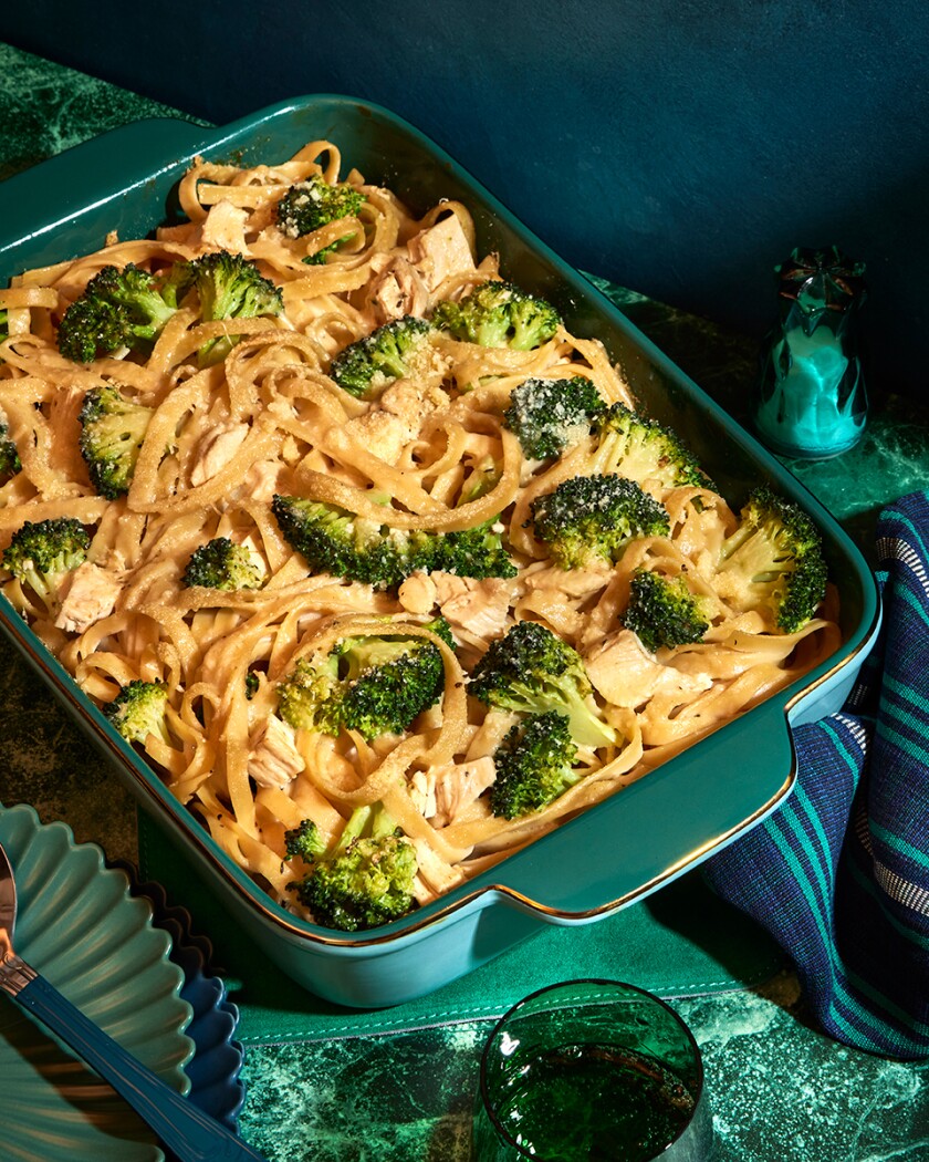 Chicken and Broccoli Alfredo Bake in emerald green casserole dish