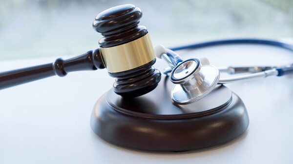 A gavel and a stethoscope 