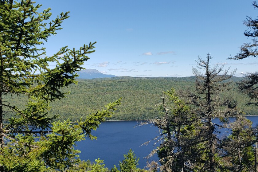 The view from Nesuntabunt Mountain (1,550 ft) on our first summit of the hike was worth the climb. Mount Katahdin, Maine's tallest peak (5,269 ft), can be seen over Nahmakanta Lake.
