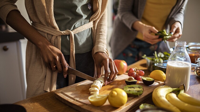 friends making a healthy meal together