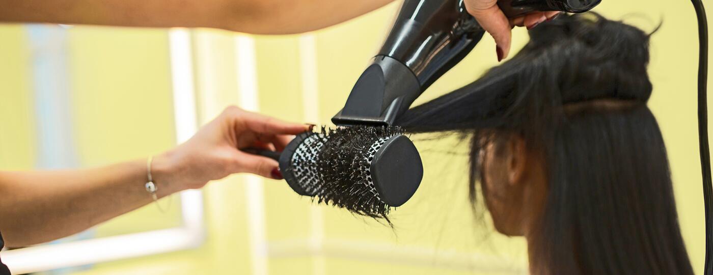 image_of_woman_getting_hair_blow_dried_GettyImages-942984986_v2_1800