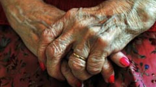 240-senior-person-hands-red-nails