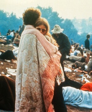 Couple embracing at the Woodstock Festival, USA 1960s