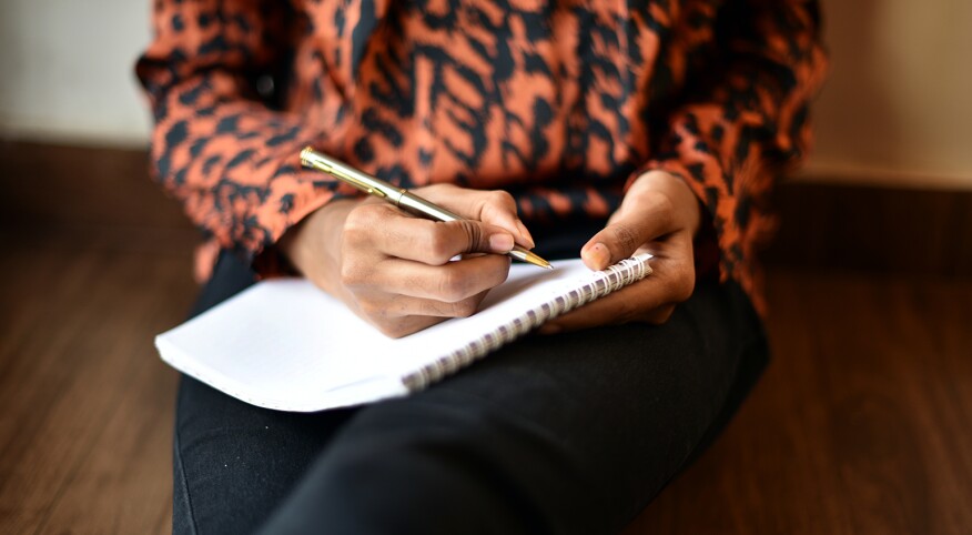 image_of_womans_hands_writing_in_notebook_GettyImages-1020523958_1540.jpg