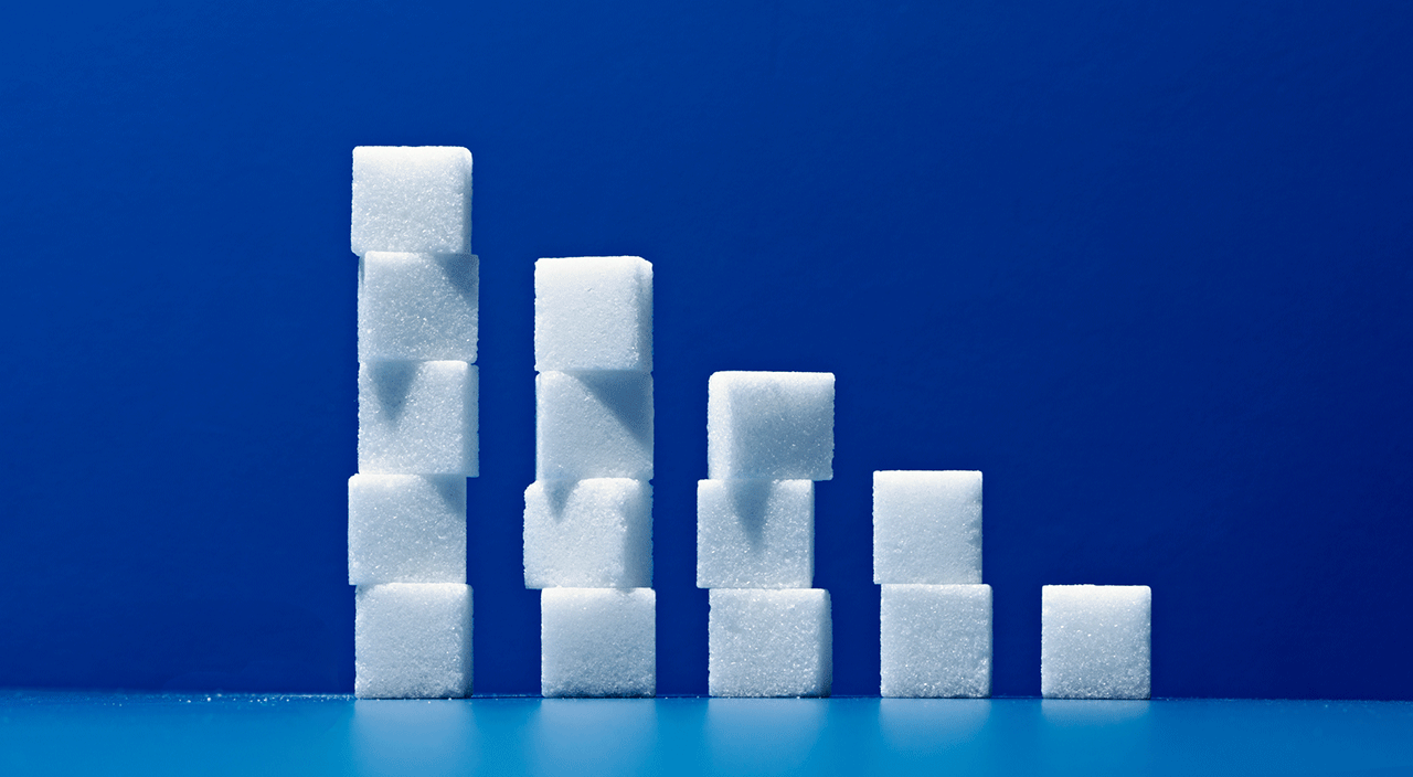 Stacks of sugar cubes progressively disappearing