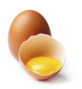Cracked egg showing its yolk