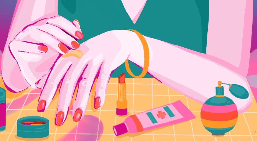 Illustration of a woman putting cream on her knuckles where arthritis pain can occur.