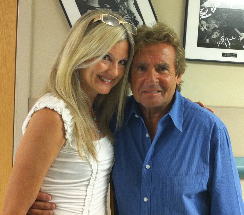 Writer Jan Tuckwood with Davey Jones of The Monkees in 2011 backstage after a show in Clearwater, Florida