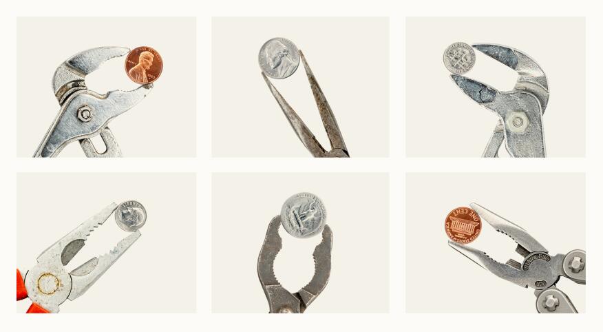 Six different hand tools holding coins