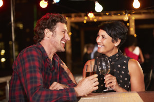 Couple at rooftop party