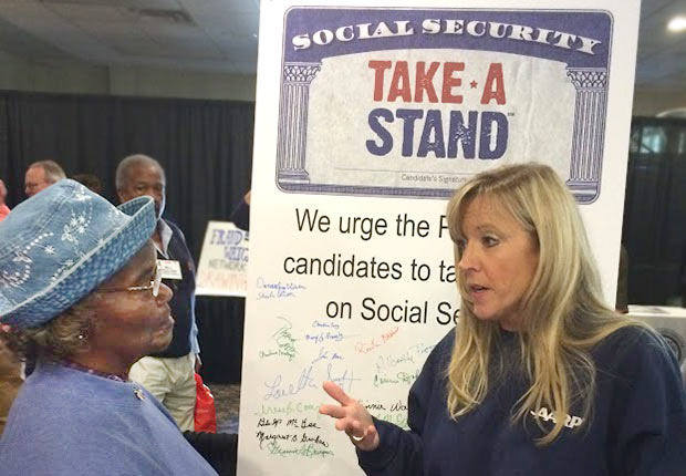 talking at a Stand for Social Security event
